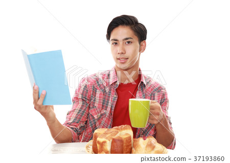 A man who enjoys meals A man who enjoys meals 37193860