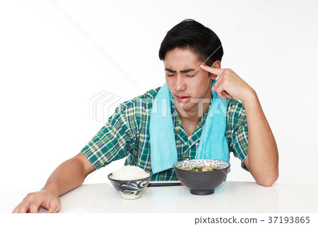 A man with a tired expression A man with a tired expression 37193865