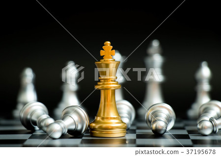 Gold king in chess game face with silver team Gold king in chess game face with silver team 37195678