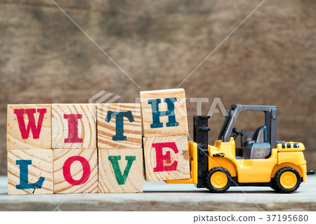 Yellow forklift hold letter H and E to with love Yellow forklift hold letter H and E to with love 37195680