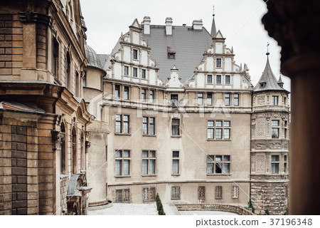 old Polish castle in the village of moszna 37196348