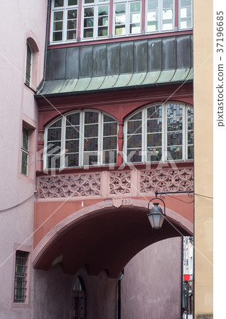 medieval city hall arch with stained glass  37196685