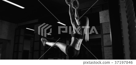 Female fitness athlete exercising Female fitness athlete exercising 37197846