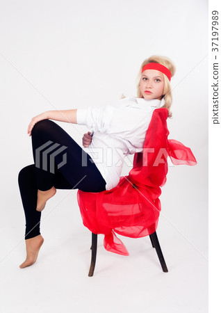 Pretty girl relaxing on chair Pretty girl relaxing on chair 37197989