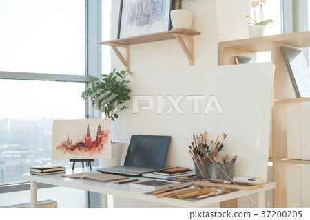 Painter workplace in order side view. Designer 37200205