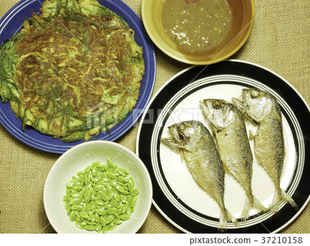 chicken omelet with local herb and mackerel fried chicken omelet with local herb and mackerel fried 37210158