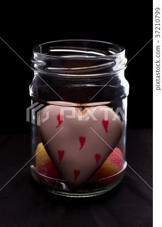 Valentines Day cookies in glass jar. 37210799