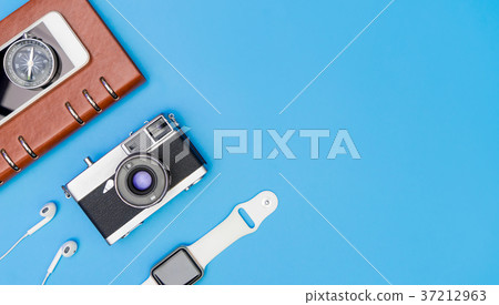 Travel object and gadget on blue copy space 37212963