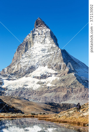 Matterhorn mountain with reflection in Switzerland 37213002