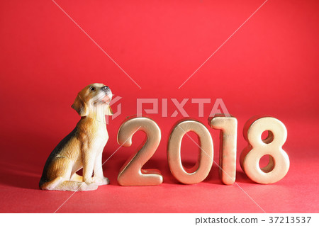 Dog with year 2018 on red background Dog with year 2018 on red background 37213537