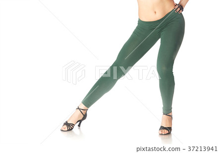 Legs of dancing woman on a white background 37213941