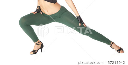 Legs of dancing woman on a white background Legs of dancing woman on a white background 37213942