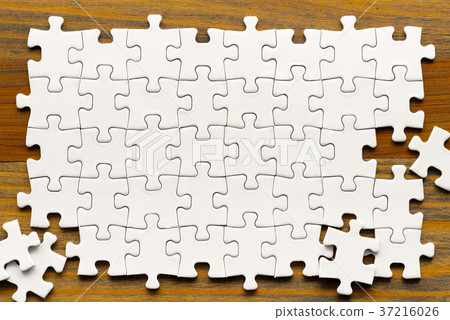 Unfinished solid puzzle background 37216026
