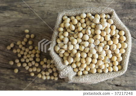 top view of raw dried soybean seeds in a sack bag top view of raw dried soybean seeds in a sack bag 37217248