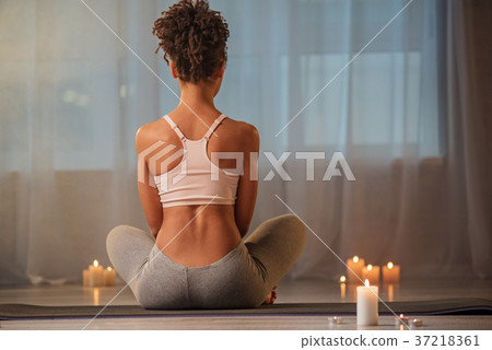 Slender girl meditating in aroma room Slender girl meditating in aroma room 37218361