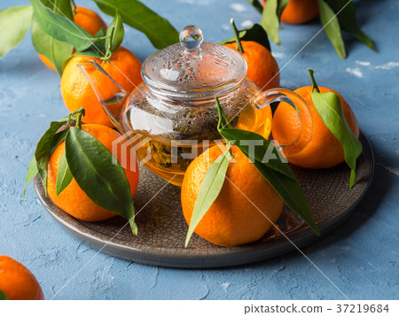 Tangerines and green tea still life Tangerines and green tea still life 37219684