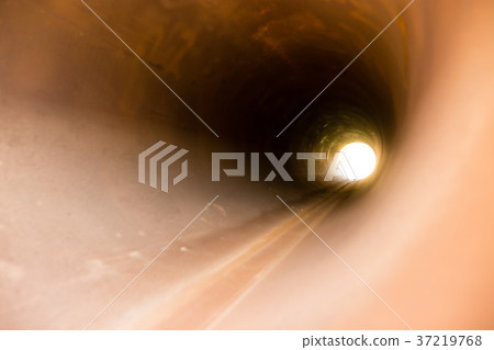 large rusty metal pipes as a background 37219768
