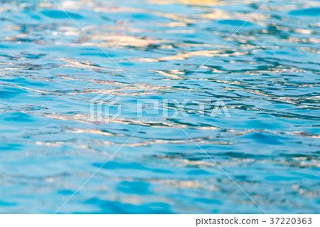The smooth water in the pool as a background The smooth water in the pool as a background 37220363