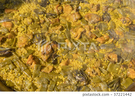 Cooking Valencian paella. Typical cuisine of the Cooking Valencian paella. Typical cuisine of the 37221442