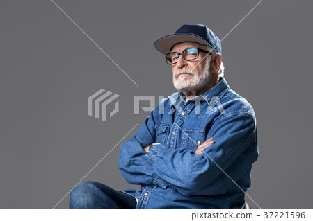 Retired high minded man resting on stool Retired high minded man resting on stool 37221596