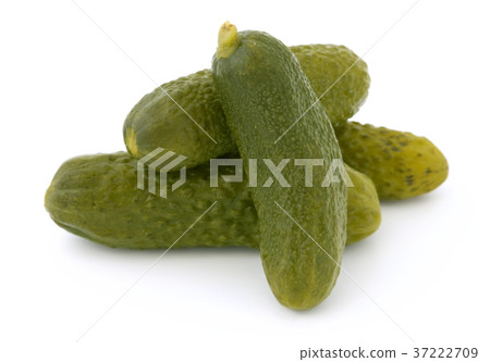Three pickled cucumbers isolated on white 37222709