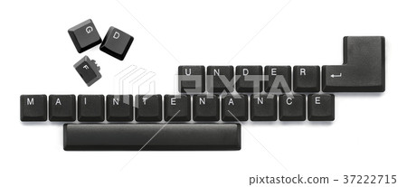 Under Maintenance text on computer keyboard Under Maintenance text on computer keyboard 37222715