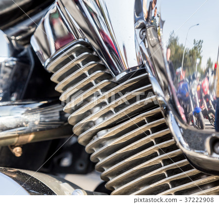 Chromed motorcycle parts on a sunny day Chromed motorcycle parts on a sunny day 37222908