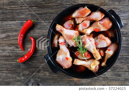 marunated raw chicken legss in pot marunated raw chicken legss in pot 37224025