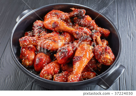 grilled teriyaki chicken legs, top view 37224030