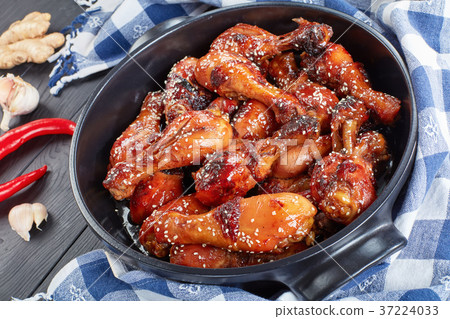 close-up of grilled crispy chicken legs close-up of grilled crispy chicken legs 37224033