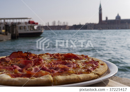 Venice, Italy pizza by the lagoon. 37225417