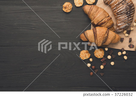 Homemade french croissants and cookies on wood 37226032