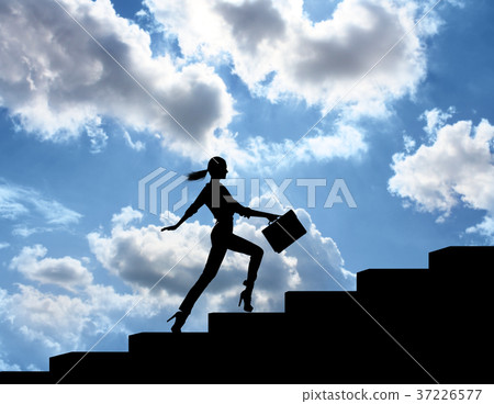 Silhouette of woman rise up on stairs from 37226577