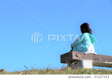 Girl gazing at the sky Girl gazing at the sky 37227331
