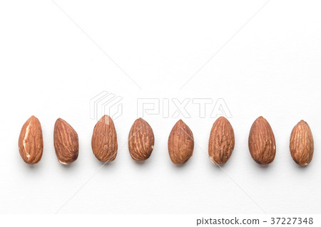 Almond close-up / white background Almond close-up / white background 37227348