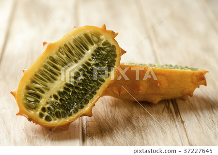 kiwano or horned melon cut in halves 37227645