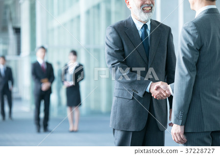 Businessman to shake hands negotiate business image Businessman to shake hands negotiate business image 37228727