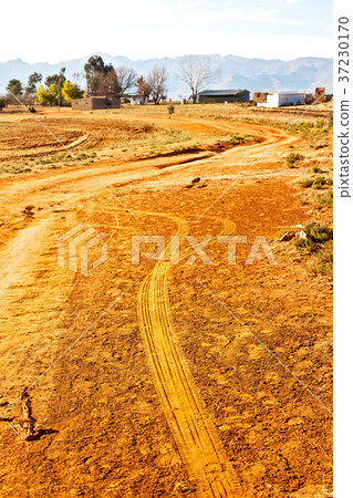 in lesotho  street village near  mountain 37230170