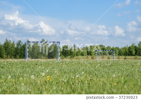 Horizontal shot of soccer field in the rural Horizontal shot of soccer field in the rural 37230823
