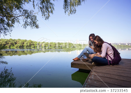 Two teenage girls Two teenage girls 37233545