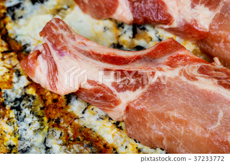 Many fresh pork chops or cutlets Many fresh pork chops or cutlets 37233772