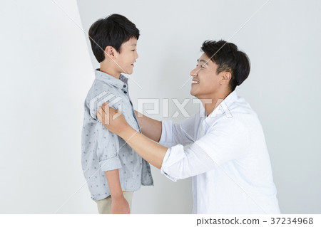 RF photo - Dad and little son isolated shot in studio 389 RF photo - Dad and little son isolated shot in studio 389 37234968