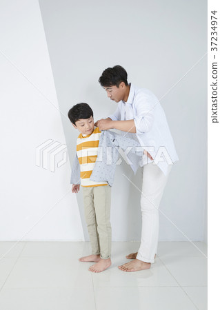 RF photo - Dad and little son isolated shot in studio 386 RF photo - Dad and little son isolated shot in studio 386 37234974