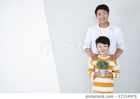 RF photo - Dad and little son isolated shot in studio 384 RF photo - Dad and little son isolated shot in studio 384 37234978