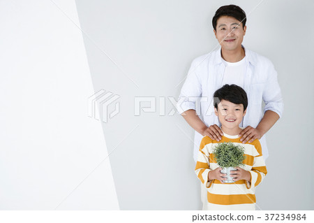 RF photo - Dad and little son isolated shot in studio 381 RF photo - Dad and little son isolated shot in studio 381 37234984