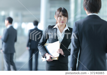 Innocent Working People Two Men and Women in Business People Business Scene Office Scene Innocent Working People Two Men and Women in Business People Business Scene Office Scene 37240865