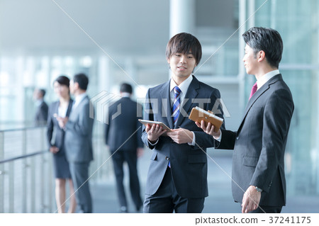 Male business image of businessman suits showing conversation Male business image of businessman suits showing conversation 37241175