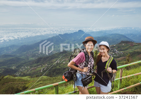 Asian tourists are enjoying selfie with friends 37241567