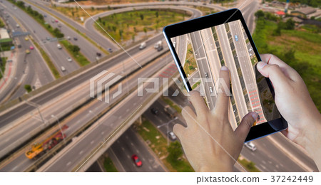 Hand holding the digital tablet Hand holding the digital tablet 37242449