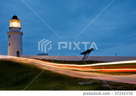 Lighthouse and traffic lights 37242550